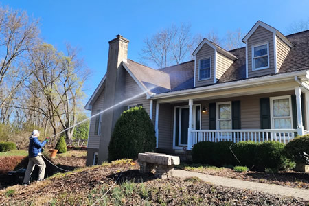 Safe Roof Cleaning in Cincinnati: Removing Gloeocapsa Magma Without Damaging Your Shingles